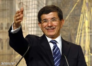 Turkey's Foreign Minister Davutoglu talks during a joint news conference with his Syrian counterpart Moualem in Istanbul