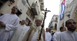Cuba's Catholic Church leader Cardinal Jaime Ortega takes part in  the annual procession of Our Lady of Charity, the patron saint of Cuba in Havana